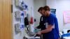 Healthcare professionals reviewing patient documents in hospital